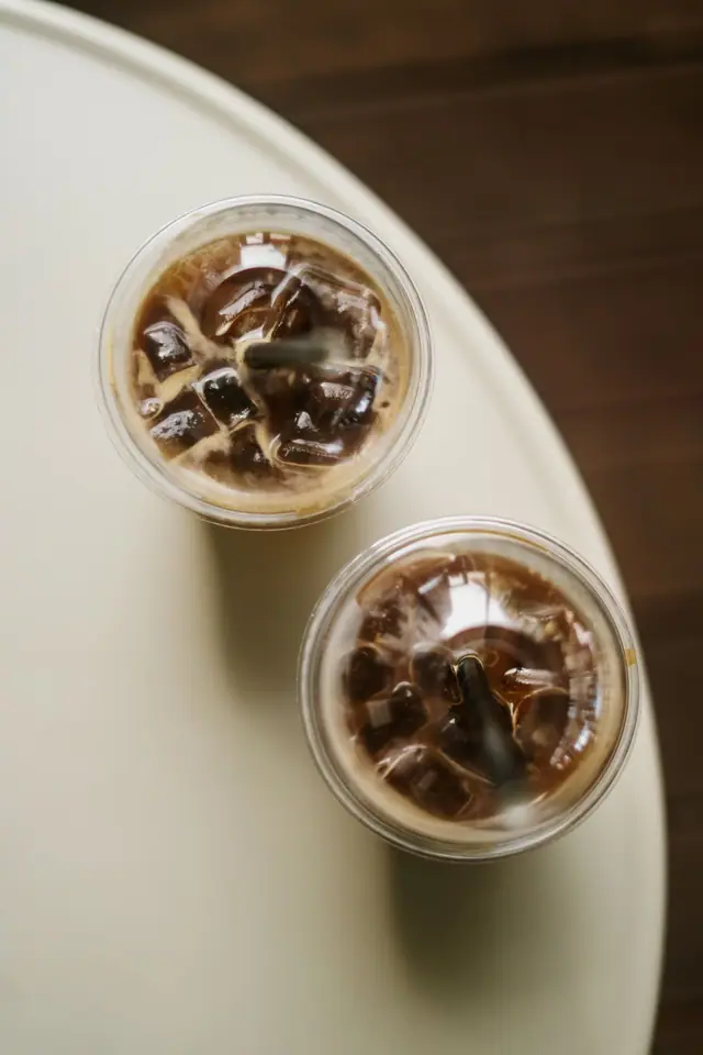 Iced coffee in clear cups, seen from above