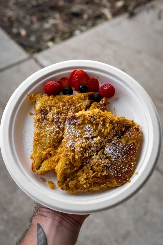 French toast and berries on a bagasse plate