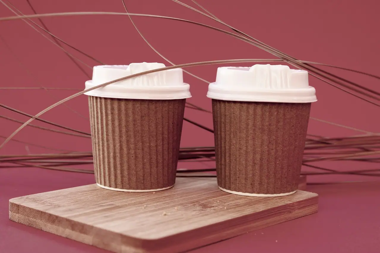Two ripple wall coffee cups with lids